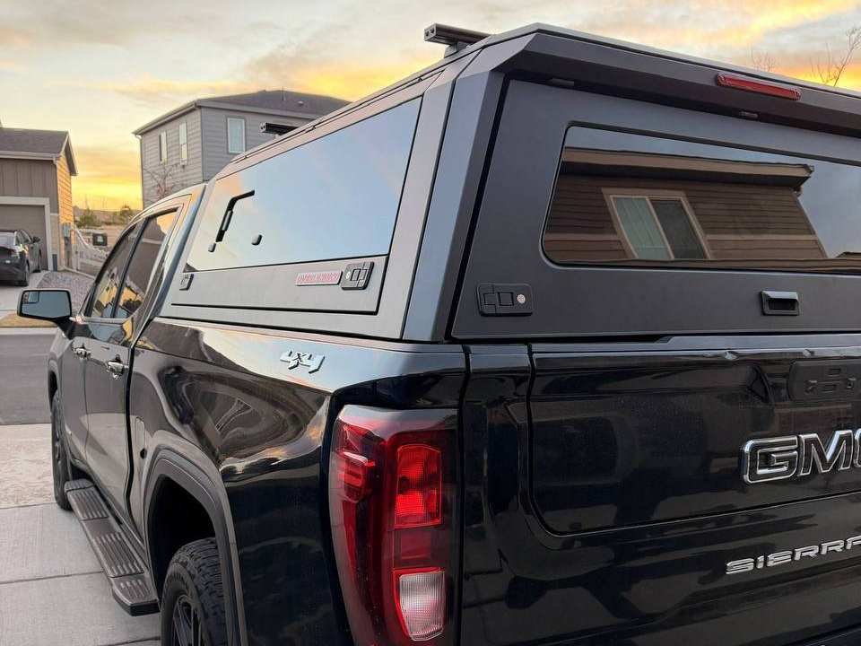 GMC Sierra 1500 with an Overlandico aluminum truck topper